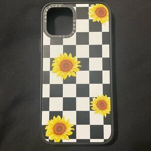 Casetify Black and White Checkered Sunflower Phone Case for iPhone 11.